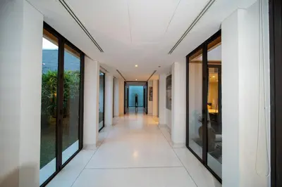 a hallway of a house with large windows at Villa Marina Cape Yamu Luxury 6 Bedroom Seaview Villa, Free Breakfast, Airport Pickup and Drop-off, Servant in Ko Lek