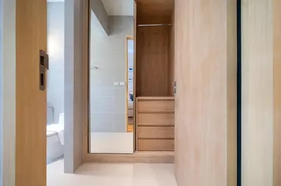 a bathroom with a toilet and a glass door at The Exclusive Sky D4 \u8c6a\u534e4\u5367\u5ba4\u6d77\u666f\u522b\u5885 \u79c1\u4eba12m\u65e0\u8fb9\u6d77\u666f\u6cf3\u6c60 \u6bcf\u65e5\u6e05\u6d01 in Kamala Beach