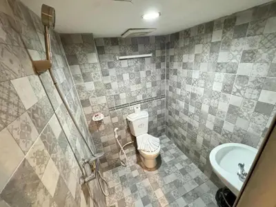 a bathroom with a toilet and a sink at Chilli House Residence in Patong Beach