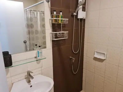a bathroom with a shower and a sink and a shower at Modern studio in Boat Avenue close to the beach in Bang Tao Beach