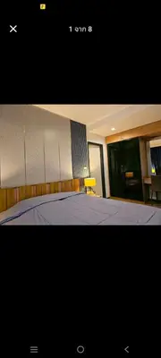 a picture of a bedroom with a bed at The deck patong 2bedroom in Patong Beach