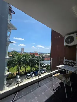 a balcony with a view of a parking lot at Seaview Residence Karon beach in Karon Beach