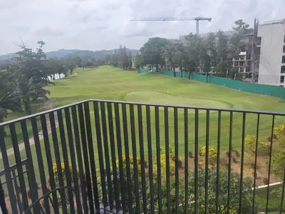 a view from the balcony of a golf course at Sky Park Laguna Residences F5 in Laguna Phuket
