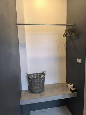 a basket sitting on a counter in a bathroom at Finlay Cottage Aonang in Ban Khlong Haeng