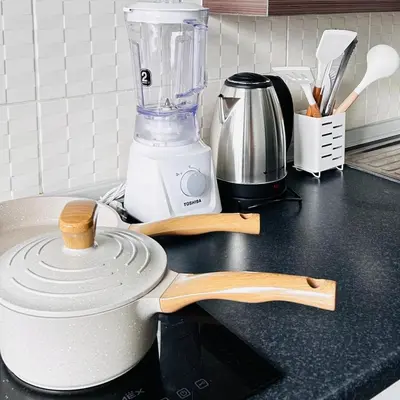 a kitchen counter with a blender on a counter top at Vista Phuket Old Town Gym Pool Wifi Netflix Walk to All in Phuket Town
