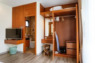 a room with a bunk bed and a television at Villa with Private Pool in Rawai in Rawai Beach