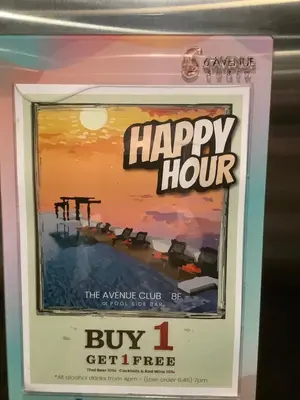 a picture of a happy hour sign in a frame at Superb Apartment! 5 Mins to the Beach in Surin Beach