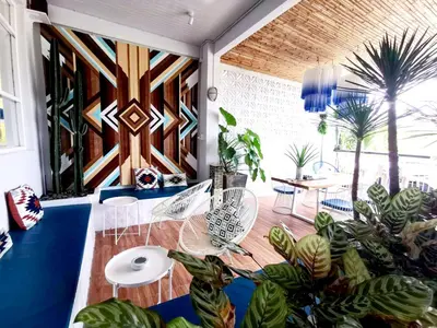 a room with a bunch of potted plants at Chill House at Naiyang in Nai Yang Beach