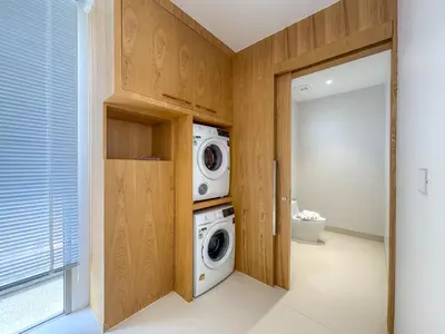 a laundry room with a washing machine and a washer and dryer at Luxurious 3-Bedroom Villa with Private Pool Lux Pride 4 L10 Phuket in Bang Tao Beach