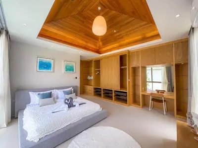 a bedroom with a large bed with a wooden ceiling at Luxurious 3-Bedroom Villa with Private Pool Lux Pride 4 L10 Phuket in Bang Tao Beach