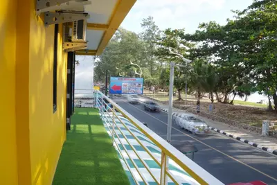 a view from the balcony of a bus at Bed & Beach Hostel Karon in Karon Beach