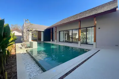 an image of a swimming pool in front of a house at Bougainvillea Luxury Pool Villas in Ban Pak Lak