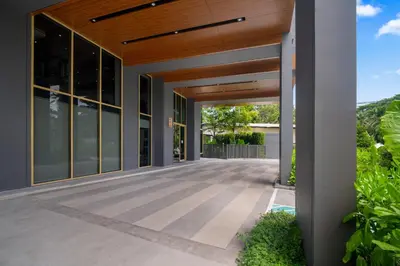 an external view of a house with a wooden ceiling at Laguna Beachside Block 3 by Banyan Living in Ban Thalat Choeng Thale