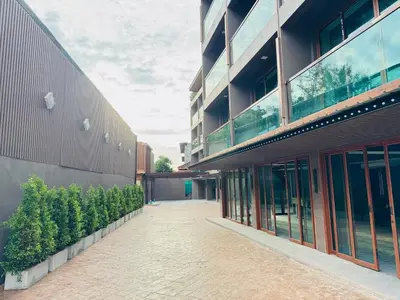 an empty hallway of a building with a courtyard at Syama V Beachfront Resort Ao Nang Krabi, Aspira Collection - Adults Only in Ao Nang Beach