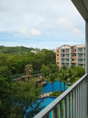 a view of the pool from the balcony of a resort at В10 Title 2-bedroom 86м2 ВатСaп66935B2I976 in Nai Yang Beach