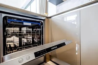 a microwave oven with its door open in a kitchen at Khanaen Luxury Pool Villa by SP in Ban Chin Tham Mai