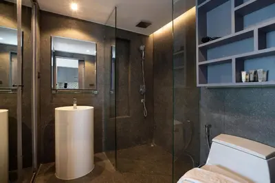 a bathroom with a shower and a toilet at Tropical Kamala Hill View 1 BR CTG P407 in Kamala Beach