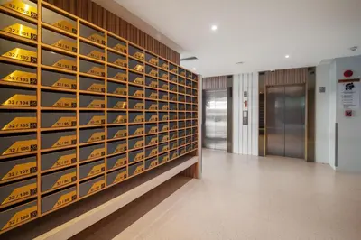 a wall of wine bottles in a hallway at Stylish Forest View Studio Near Naithon Beach 1528 in Nai Thon Beach