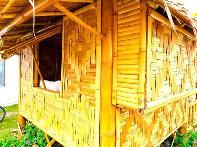 a wicker dog house with a window in it at Patong Canal House 1 in Patong Beach
