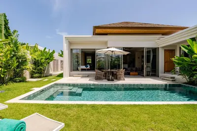 a swimming pool in the backyard of a villa at Tropical Family Pool Villa - Bang Tao in Laguna Phuket