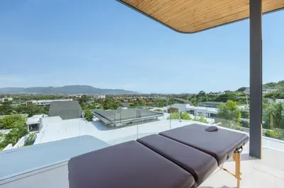 a couch on the roof of a house at Villa Zavaya 360° View Luxury Retreat With Pool in Layan Beach