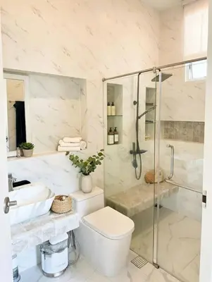 a bathroom with a shower and a toilet and a sink at Kamala Beach Phuket - 4BR Private Luxury Pool Villa with Maid in Kamala Beach