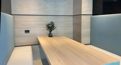 a plant sitting on a table in a room at Space Cherngtalay Condo in Elegant Bang Tao in Ban Thalat Choeng Thale