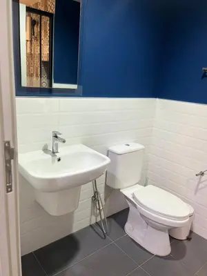 a bathroom with a toilet and a sink at The Base Central Phuket-B2-Y9B in Ban Rangeng