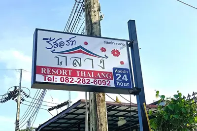 a sign for a restaurant that says resort challenge at Resort Thalang in Phuket