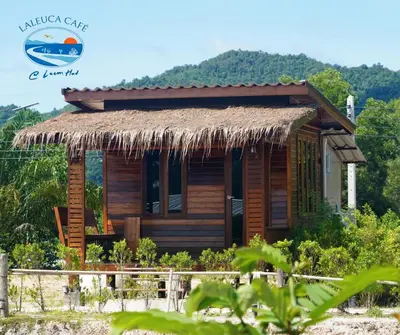 a small wooden house with a straw roof at Laleuca At Laemhad Kohyaoyai in Ko Yao Yai