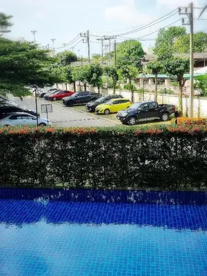 a view of cars parked in a parking lot at Supalai Park Phuket City 2 bedrooms for rent in Phuket Town
