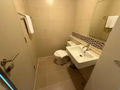 a small bathroom with a sink and a toilet at Dcondo Creek Phuket 2BR in Kathu