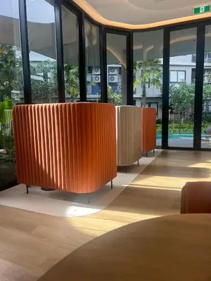 a lobby with orange dividers in a building at Luxury cosy condo in Kathu centre in Kathu