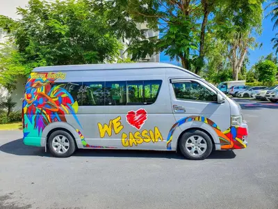 a white van with colorful graffiti on the side of it at Cassia Phuket, part of Banyan Group in Bang Tao Beach