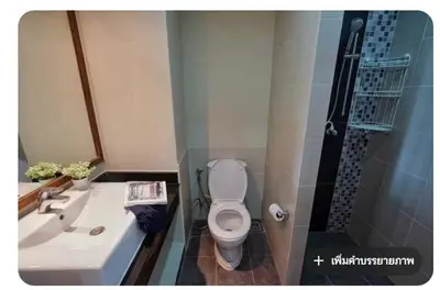 a bathroom with a sink and a toilet and a shower at Phuket Avenue in Phuket Old Town in Phuket Town