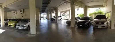 a large parking lot with cars parked in it at Phuket Avenue in Phuket Old Town in Phuket Town