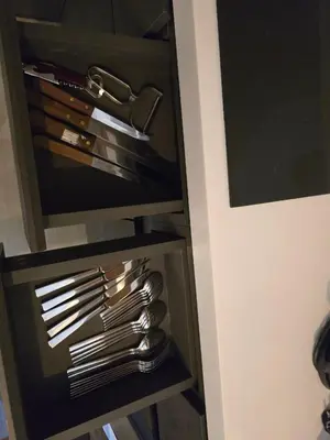 a drawer filled with silver forks and knives at Laguna Lakeside BangTao Лагуна Лейксайд Lagoona operated by OK Group in Bang Tao Beach