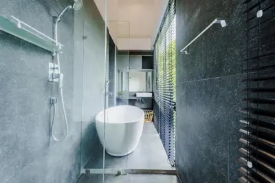 a bathroom with a shower and a bath tub at Harmony Exclusive Villa Bang Tao Phuket in Ban Thalat Choeng Thale