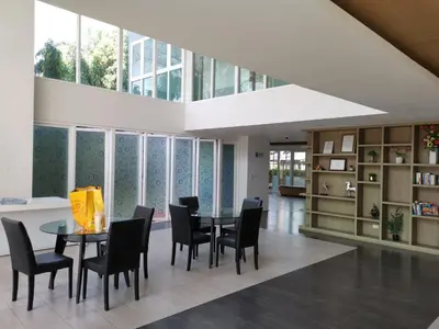 a dining room with a table and chairs at 6 Floor - Studio room at OZC near Kata beach in Kata Beach