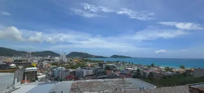 a view of a city with the ocean at Andaman Seaview house rooftop 2 in Patong Beach