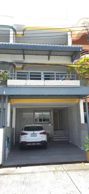a car parked in the garage of a house at Andaman Seaview house rooftop 2 in Patong Beach