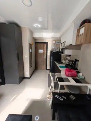 a small room with a kitchen with a counter and a kitchen at Lux apartment Mai Khao beach in Mai Khao Beach