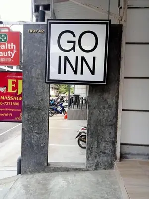 a sign that says go inn on the side of a building at XX GO INN Aonang Beach - หาดอ่าวนาง กระบี่ in Ban Khlong Haeng