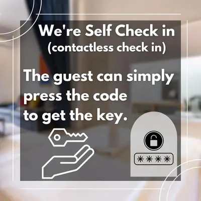a sign that says were self check in contactless check in at XX GO INN Aonang Beach - หาดอ่าวนาง กระบี่ in Ban Khlong Haeng