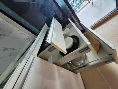 a white refrigerator with its door open in a kitchen at cen 1 bed room862 in Ban Rangeng