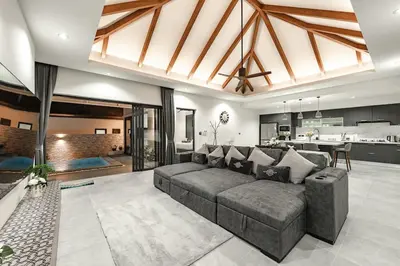 a living room with a couch and a kitchen at V162 Super Modern Brand New Stunning Design in Rawai Beach