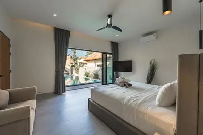 a bedroom with a large bed and a large window at V162 Super Modern Brand New Stunning Design in Rawai Beach