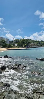 a view of a beach with rocks in the water at Phuket, The Pixcel Cape Panwa Condo in Ban Ao Makham