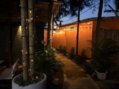 a courtyard with a pole with lights on it at Pangea Stay in Kathu