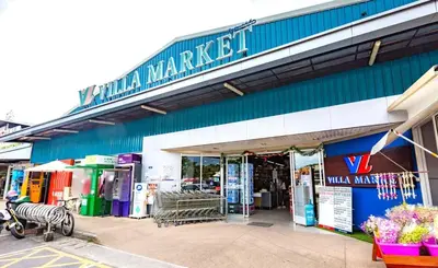 a store with a zebra standing in front of it at New studio near Boat Avenue by Lofty in Bang Tao Beach